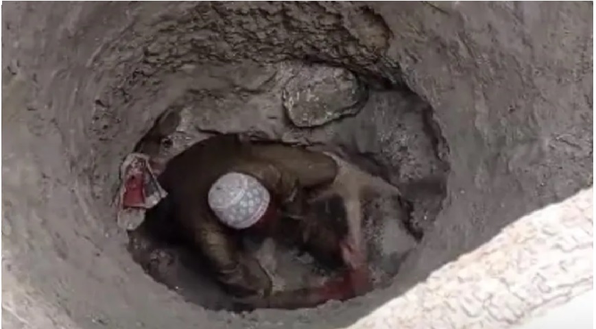 (Image Credit: Premium Times) A miner inside a mining pit located inside a forest